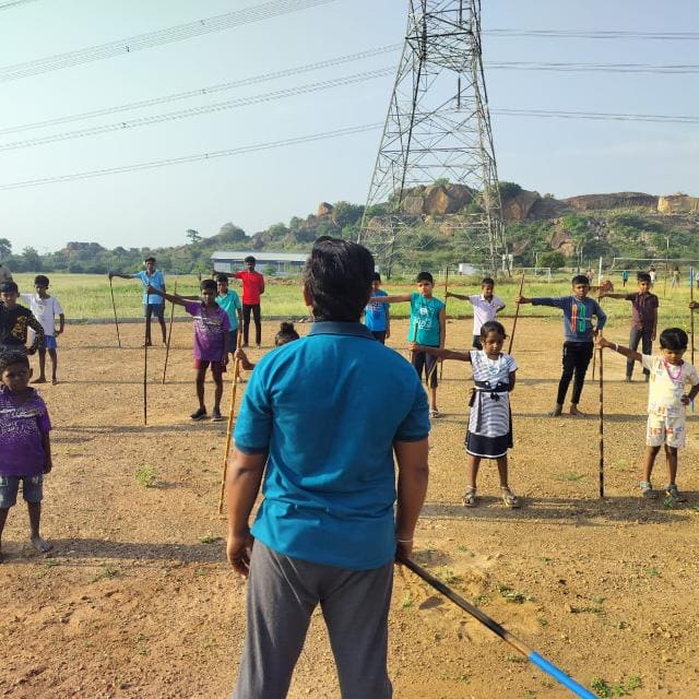 Silambam practice on the academy ground